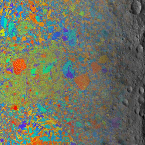 Ancient micrometeoroids carried specks of stardust, water to asteroid 4 Vesta