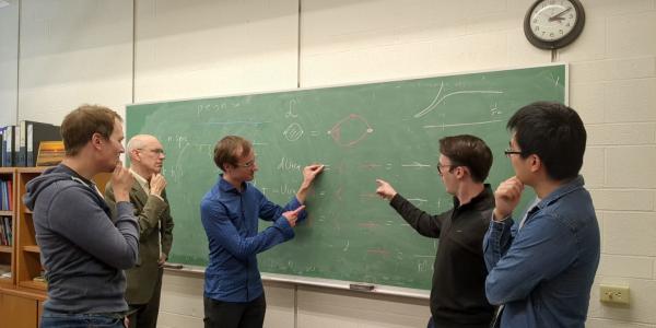 Liam Brodie and collaborators work on astrophysics problems in the classroom