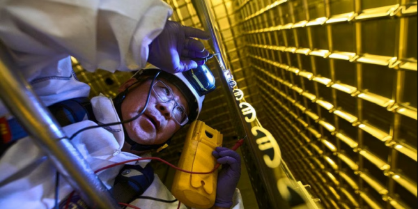 Jaehoon Yu at work on the DUNE prototype detector at CERN, the European Center for Nuclear Research in Switzerland. (CERN)
