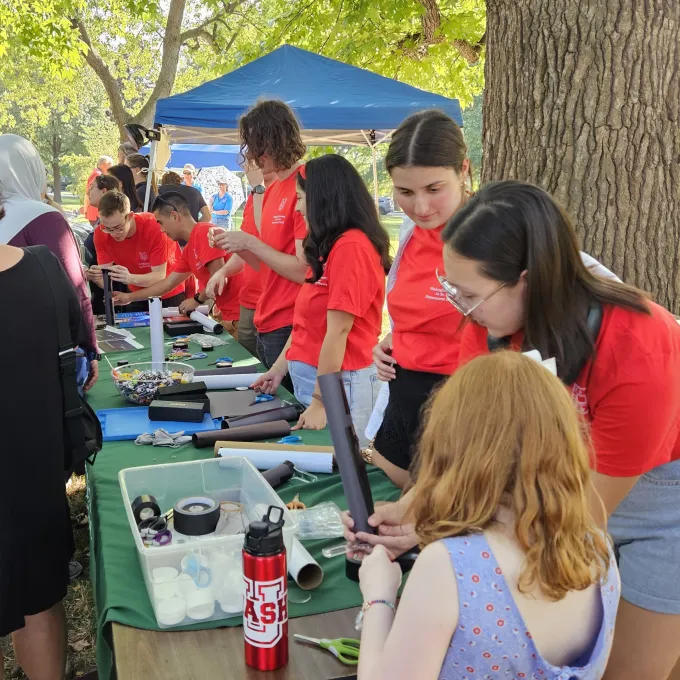 Physics department students manning a table at the Annual Astronomy Festival at Tower Grove Park (Sep 30, 2023)