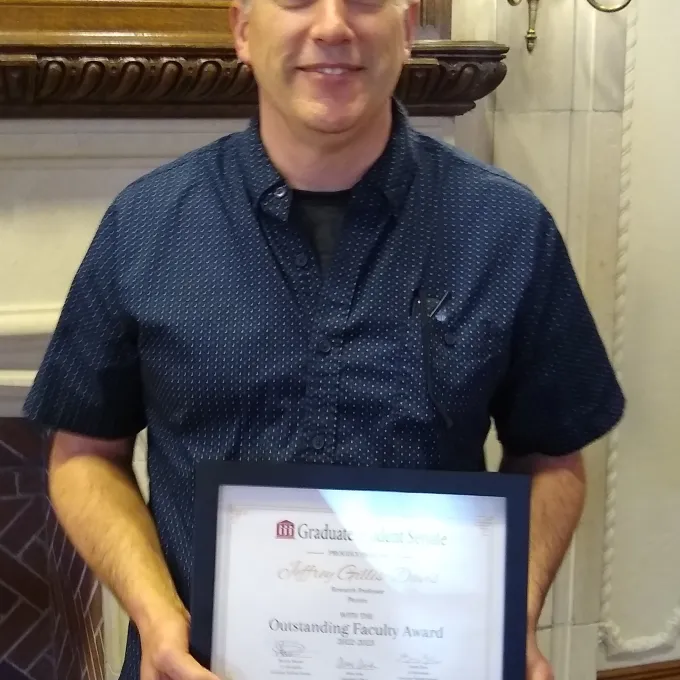 Jeff Gillis-Davis with his award